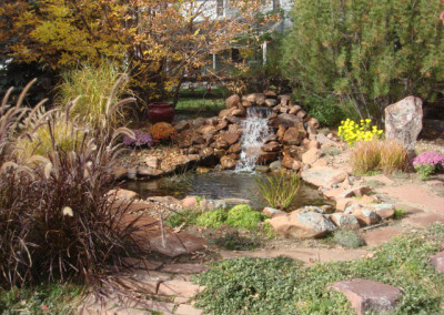 Custom Stone Waterfall and Pond, Boulders, Flagstone Pathway, Outdoor Room